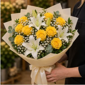 Buchet floral cu trandafiri galbeni si crini albi luminos - poza 2